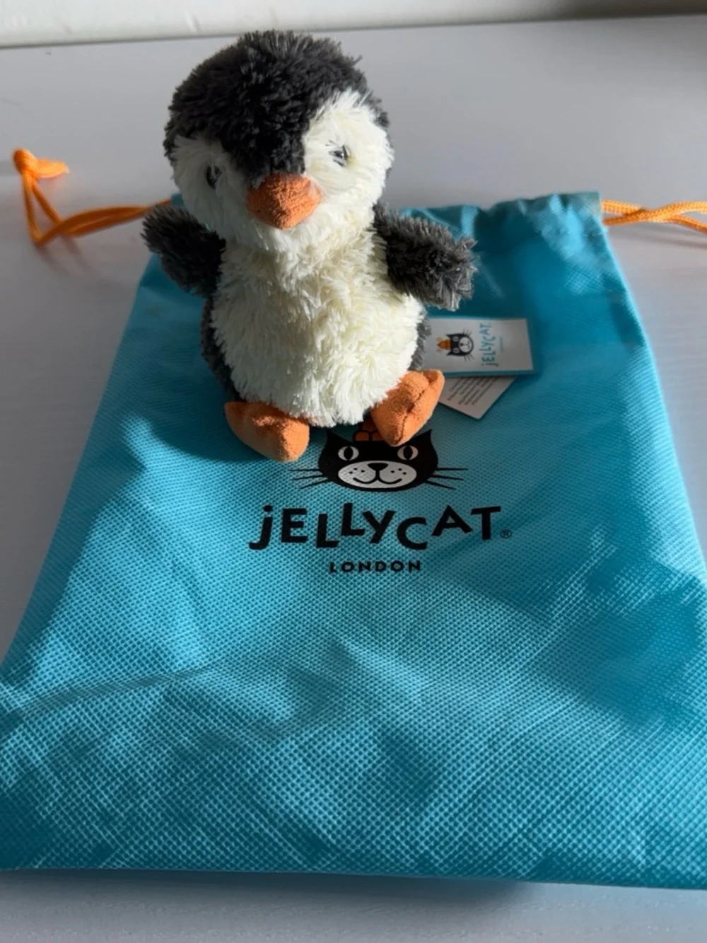 Jellycat Plush Penguin in Cream, Gray and Orange